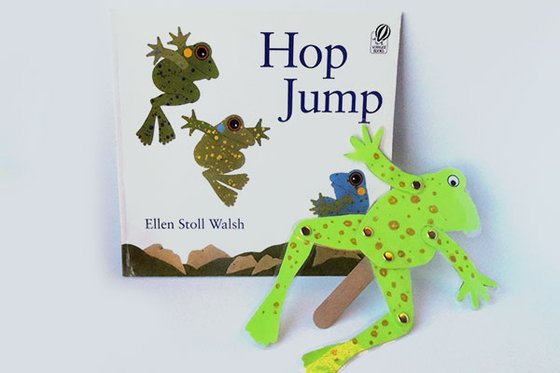 Book " Hop Jump" with a green paper frog. 