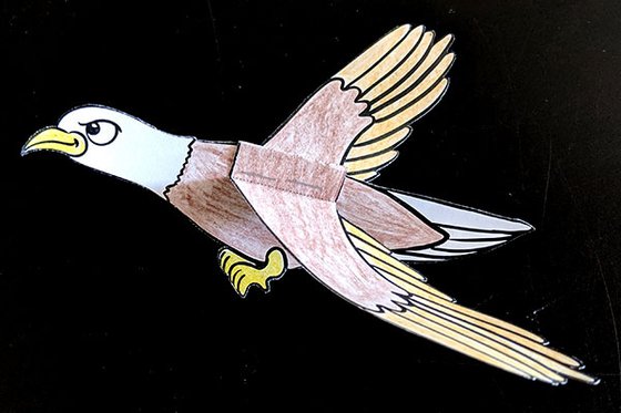 A paper image of a bald eagle. 