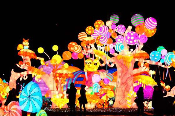 A variety of colorful, glowing lanterns. 