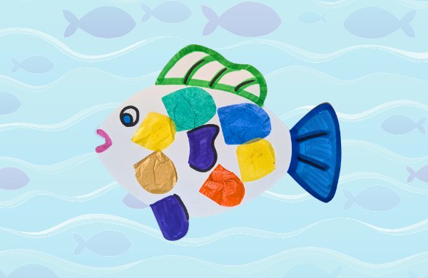 A paper colorful fish decorated with tissue paper scales against a graphic of water and fish. 