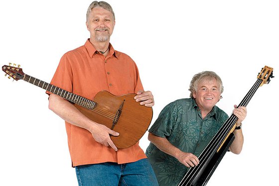 Two artists holding string instruments. 