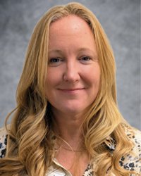 a head shot of Jessica Boccio against a gray background