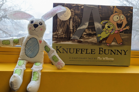 The book Knuffle Bunny and a white fabric bunny decorated with paint markers.