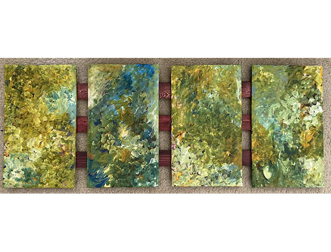 Four canvases in a row painted with petals in hues of green, blue, and white. 