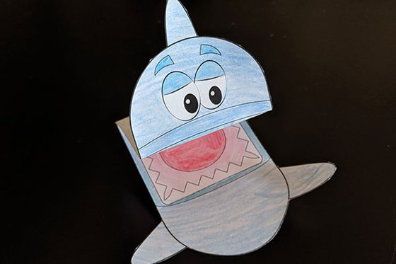 A paper shark puppet. 