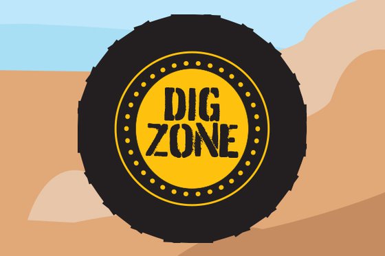Graphic of a large black tire with a yellow center and text "Dig Zone" in an industrial font against a dirt hill and blue sky. 