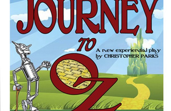 Graphic of a 'tin man', green pasture with a yellow brick road leading to a castle and text "Journey to Oz; A New Experiental Play by Christopher Parks."