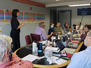 Museum staff meeting to plan exhibit content.